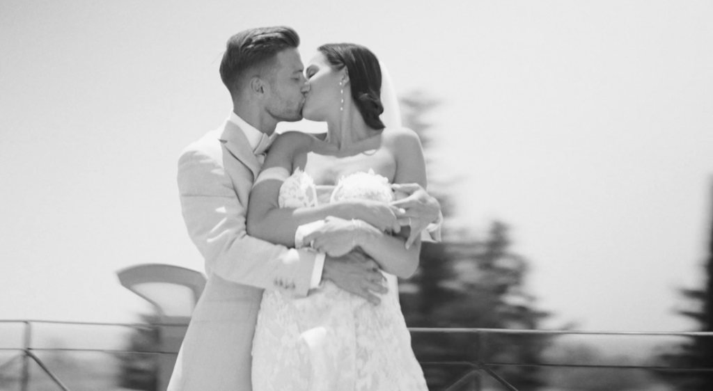 wedding photographer europe bride and groom kissing emotional wedding moment